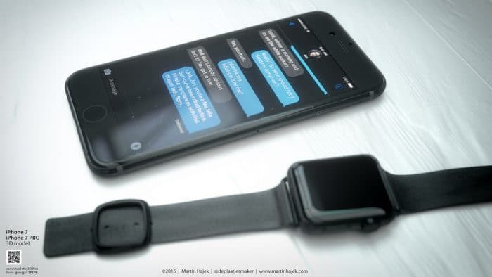 Kép: A teljesen fekete készülék és mellette egy asztrofekete Apple Watch modern csatos szíjjal.